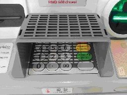 Cover the ATM keypad with your hand